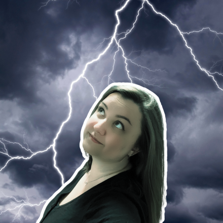 Woman with a dark background and lightning effects